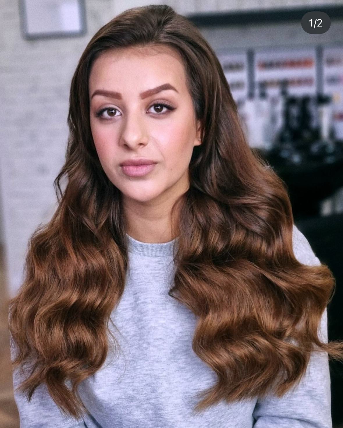 Natuurlijke hairextensions van topkwaliteit, professioneel geplaatst voor een vol, lang en stralend resultaat dat maanden meegaat.